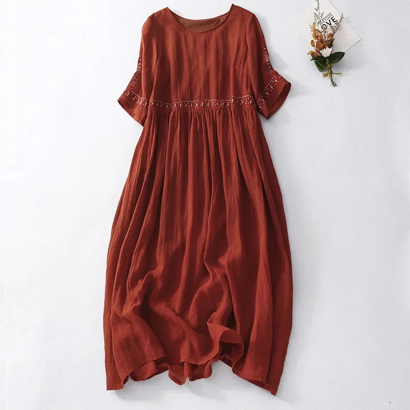 Brown cotton-linen midi dress with boho embroidery, flat lay