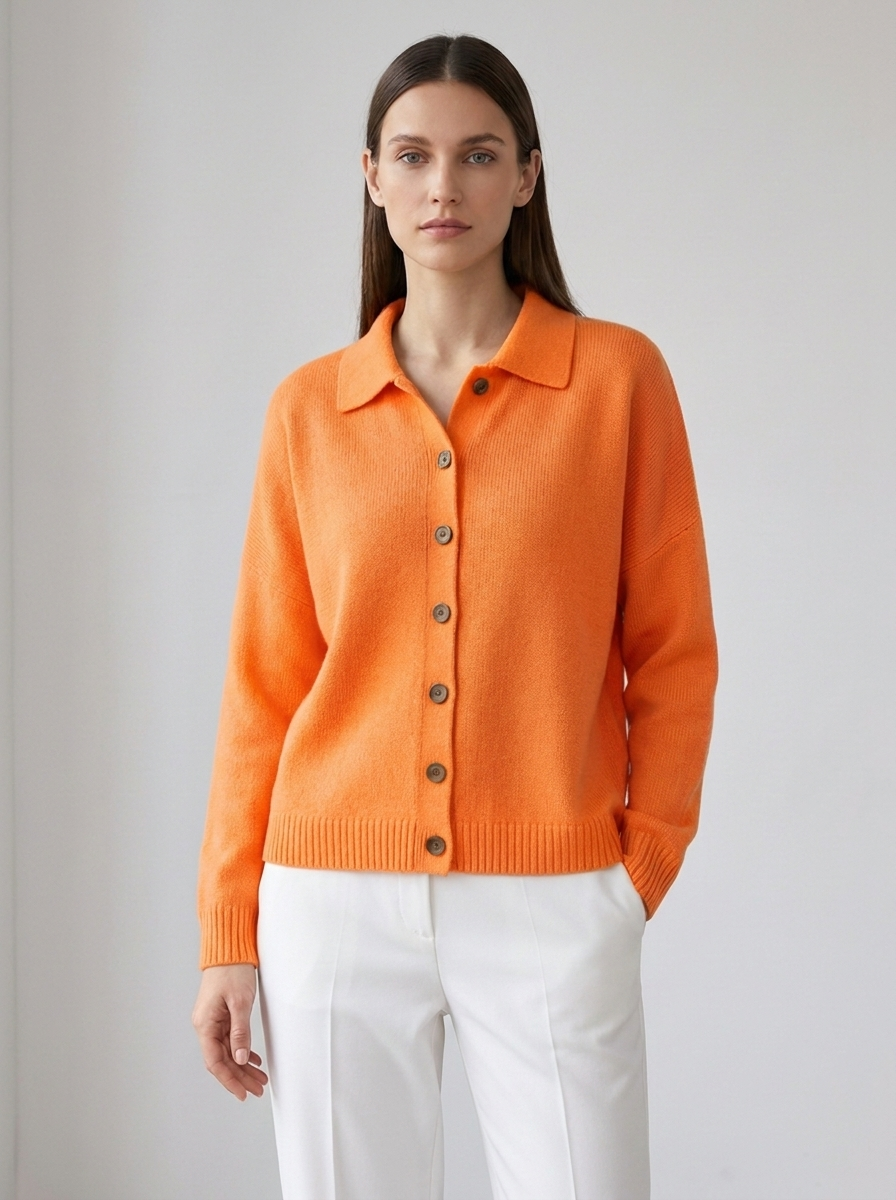 Mathilde orange collared knit cardigan on model, studio front view