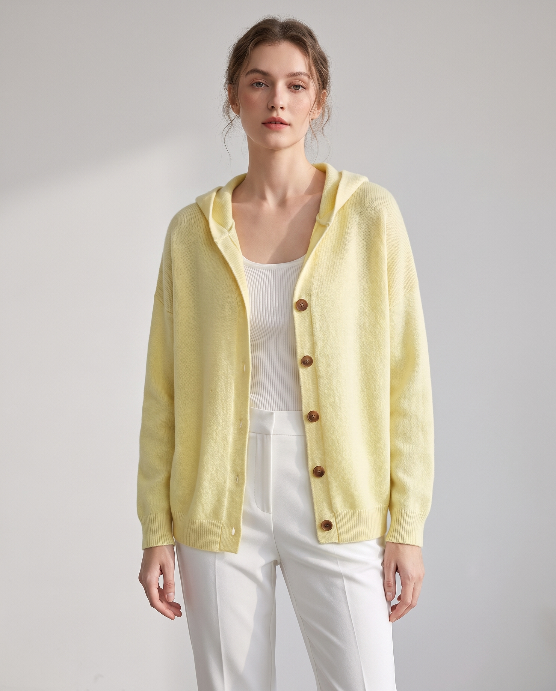 Lucille hooded button-front knit cardigan in yellow, studio front view