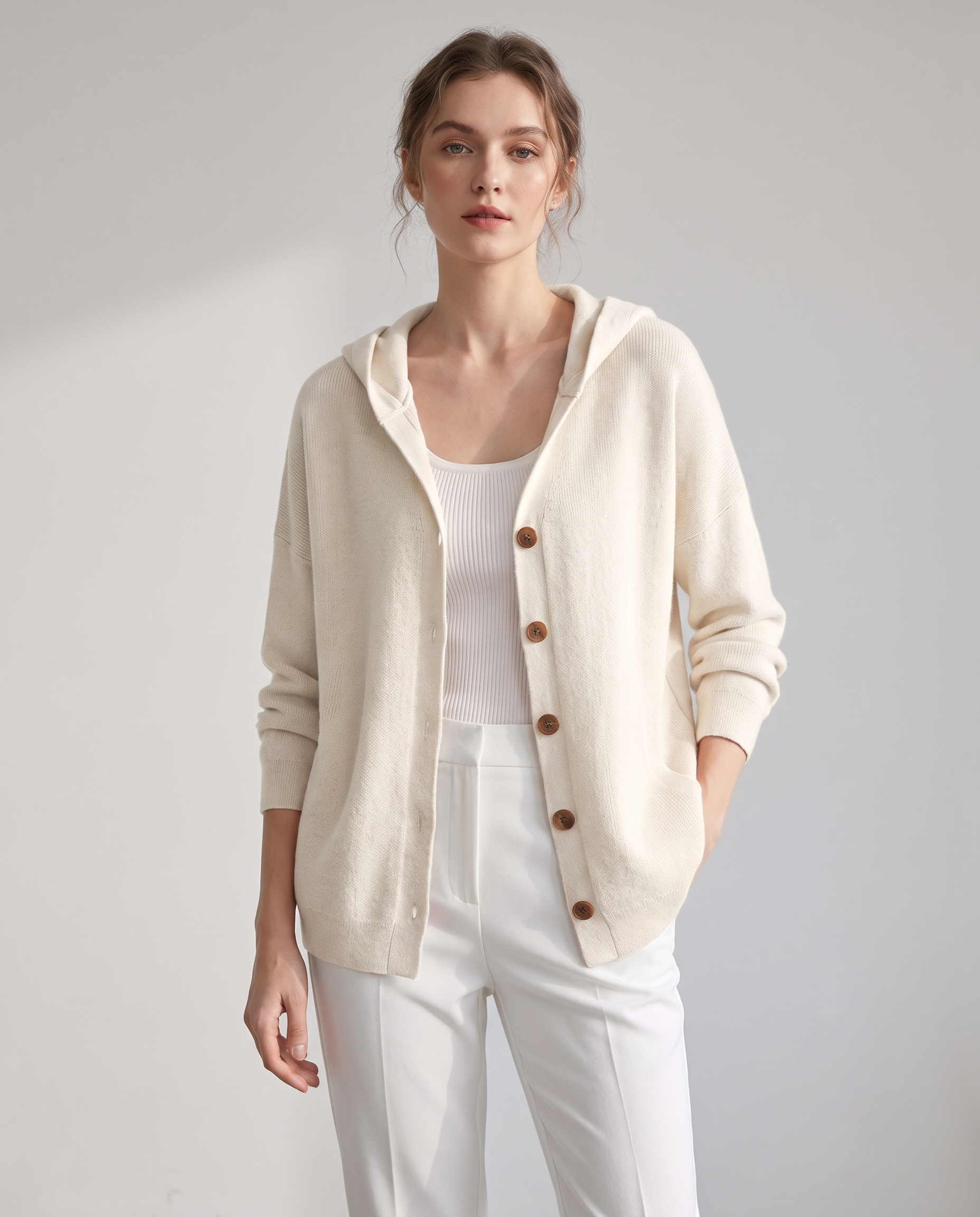 Lucille hooded button-front knit cardigan in white, studio front view