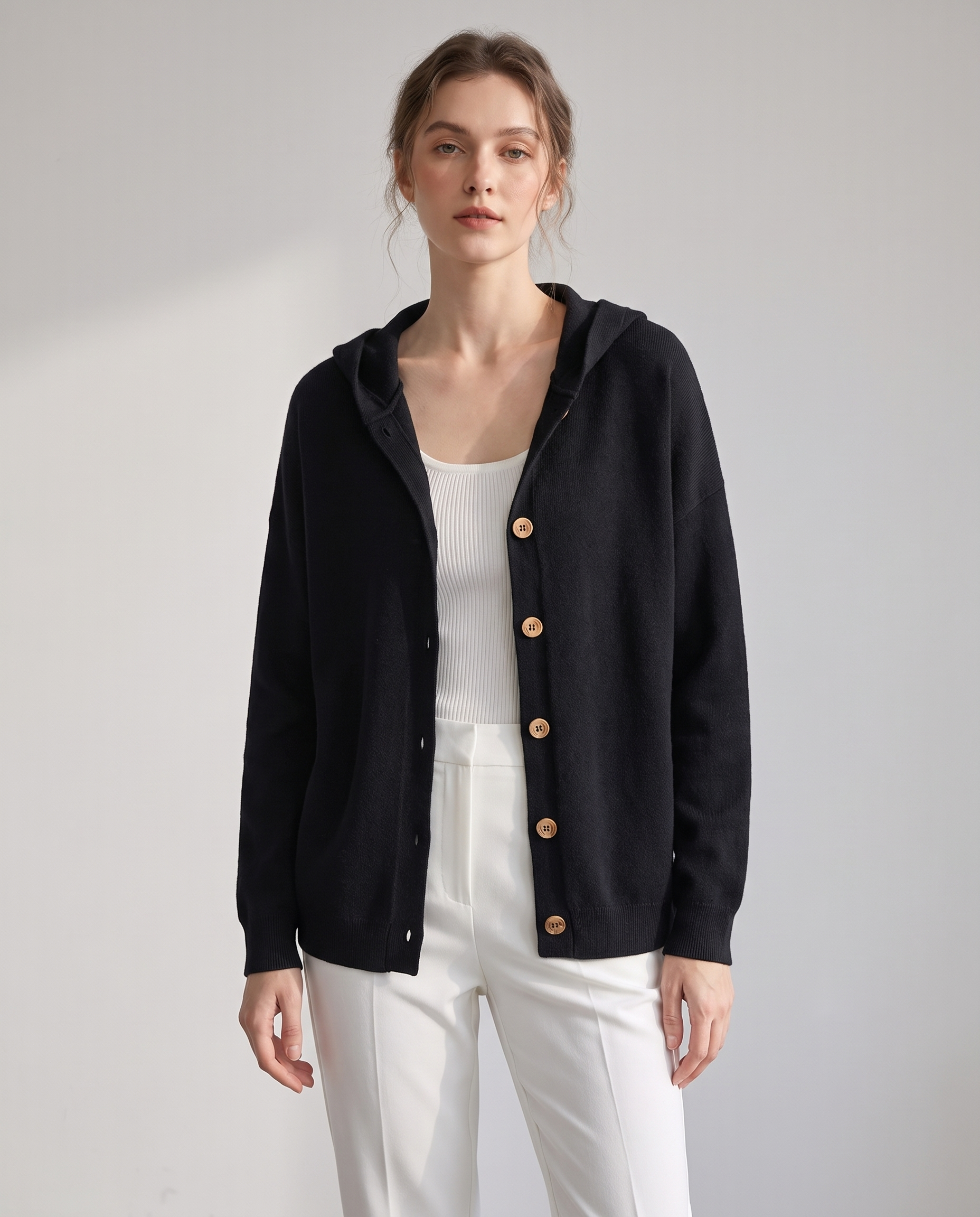 Lucille hooded button-front knit cardigan in black, studio front view