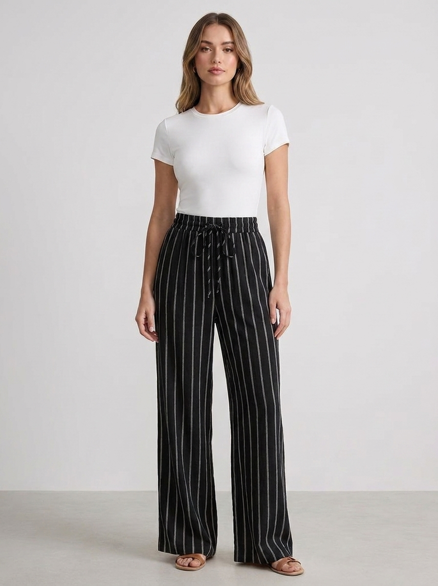 Women's black striped high-waist drawstring wide-leg trousers, front full-body studio