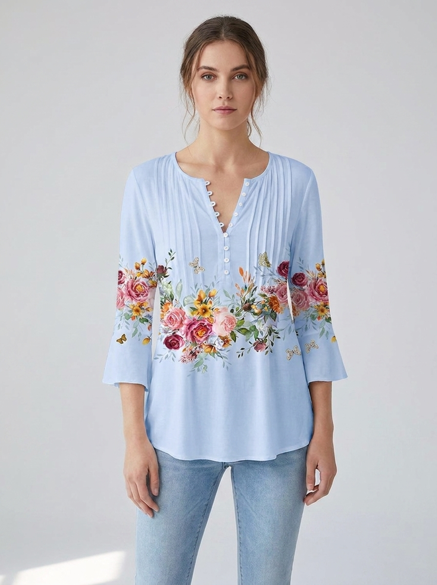 Light blue floral long-sleeve henley blouse, front view