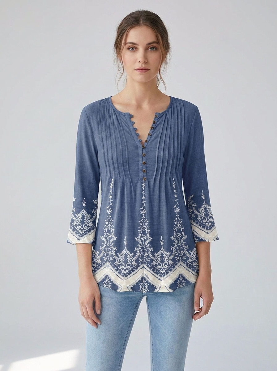 Denim-blue henley blouse with white boho border print, front view
