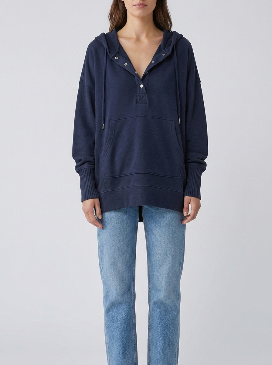 Woman wearing navy marine oversized hooded drawstring tunic top