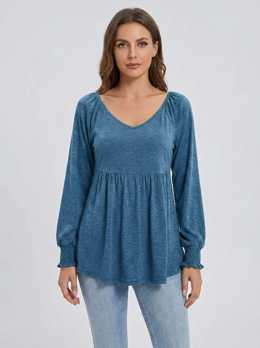 Women's denim-blue babydoll V-neck long-sleeve smocked-cuff tunic, front studio view
