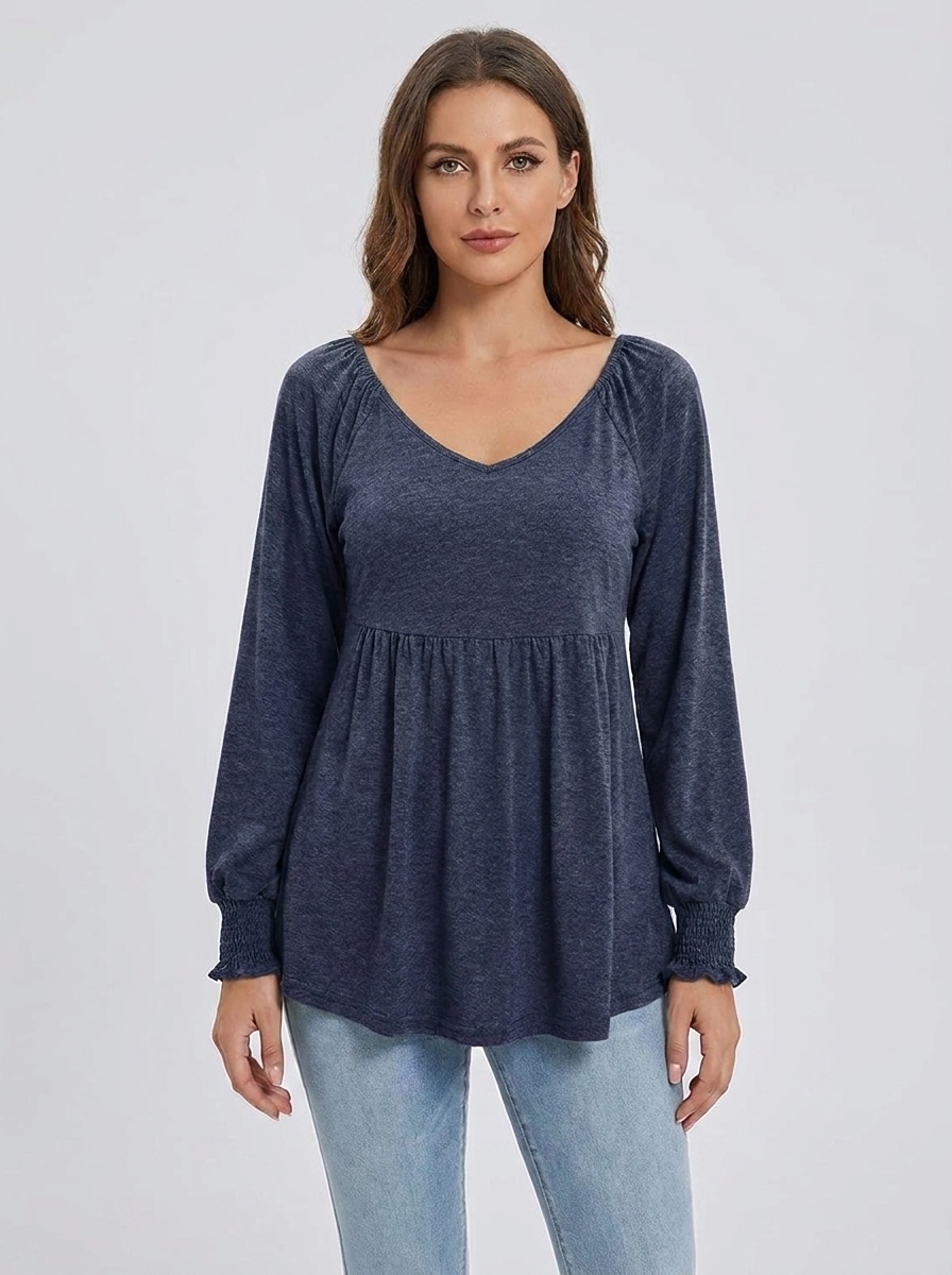 Women's navy babydoll V-neck long-sleeve smocked-cuff tunic, front studio view