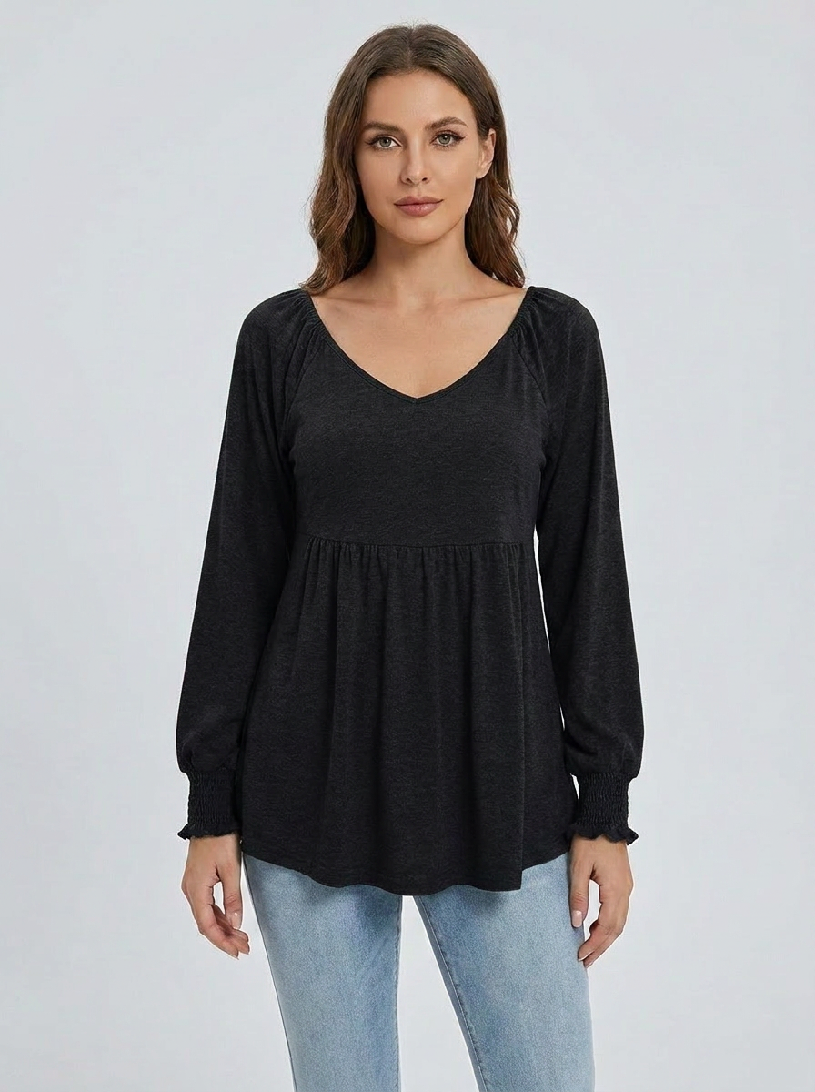 Women's black babydoll V-neck long-sleeve smocked-cuff tunic, front studio view