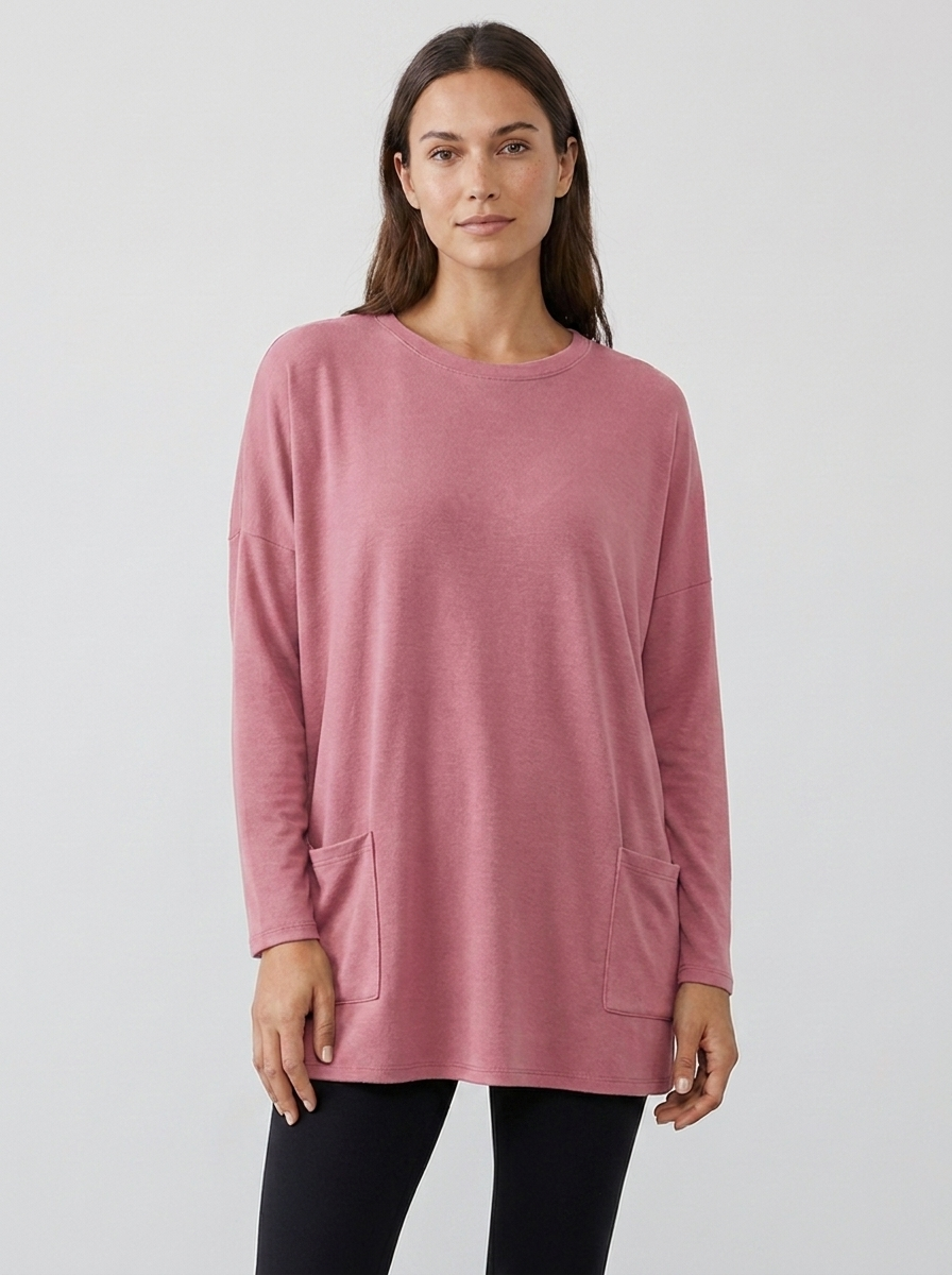 Women's oversized long-sleeve pocket tunic top in rose pink, front view