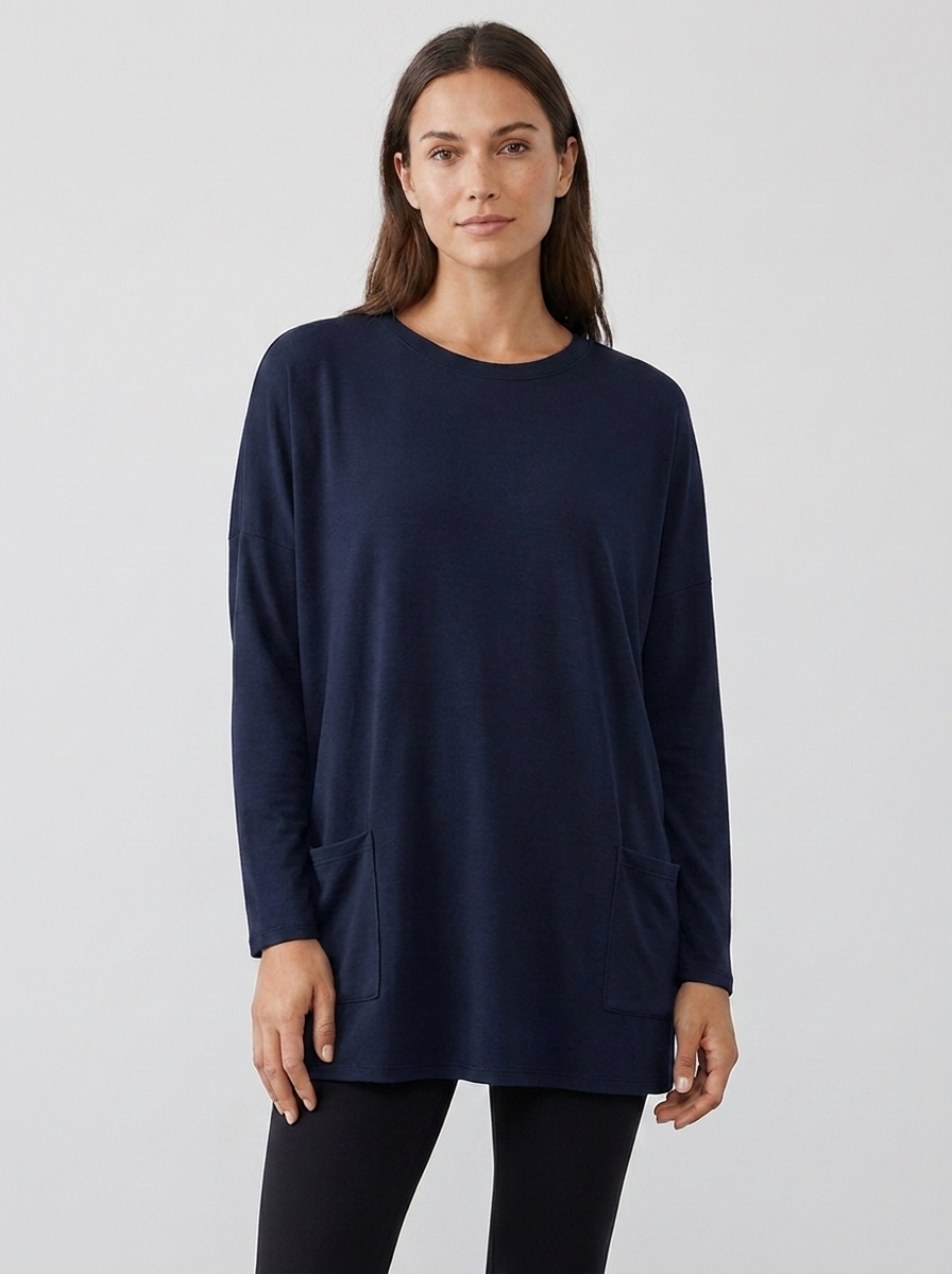 Women's oversized long-sleeve pocket tunic top in navy blue, front view