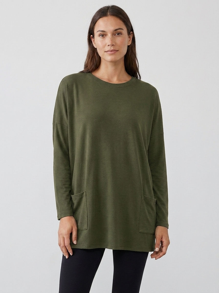 Women's oversized long-sleeve pocket tunic top in olive green, front view