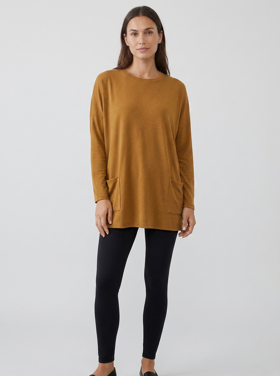 Women's oversized long-sleeve pocket tunic top in brown, front view