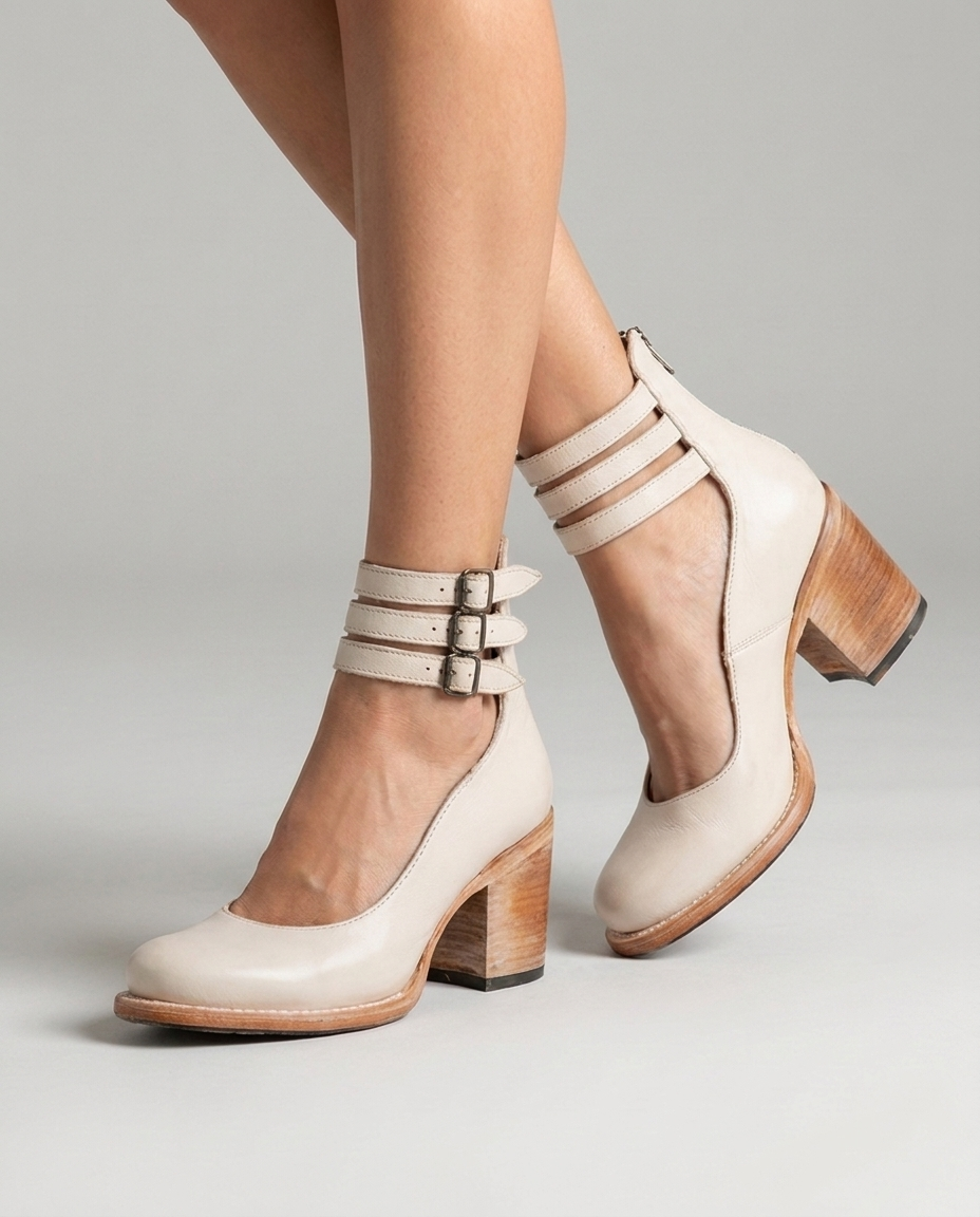 White closed toe block heel pumps with triple ankle straps