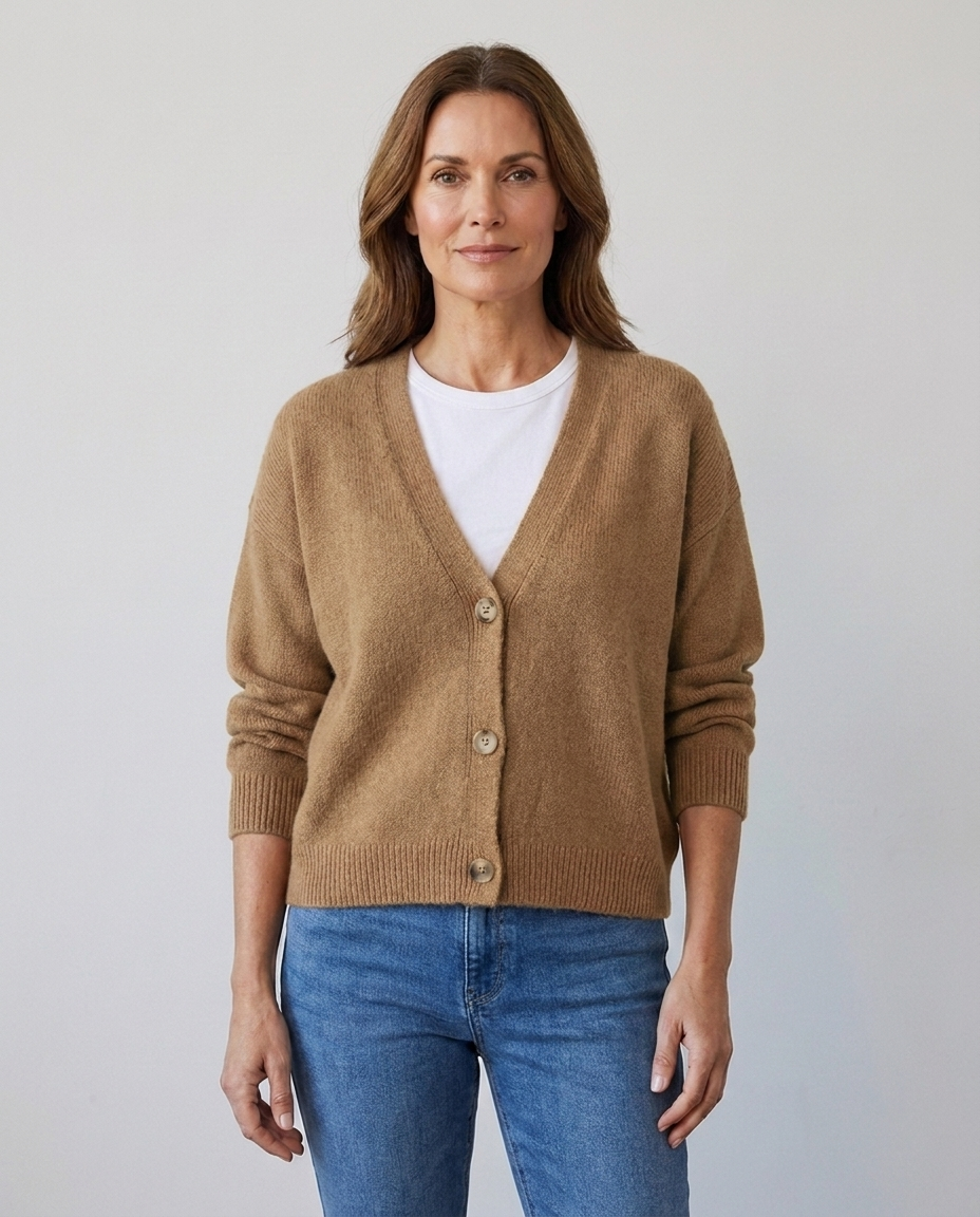 Women's relaxed knit button-front V-neck cardigan in khaki, worn over a white tee with jeans