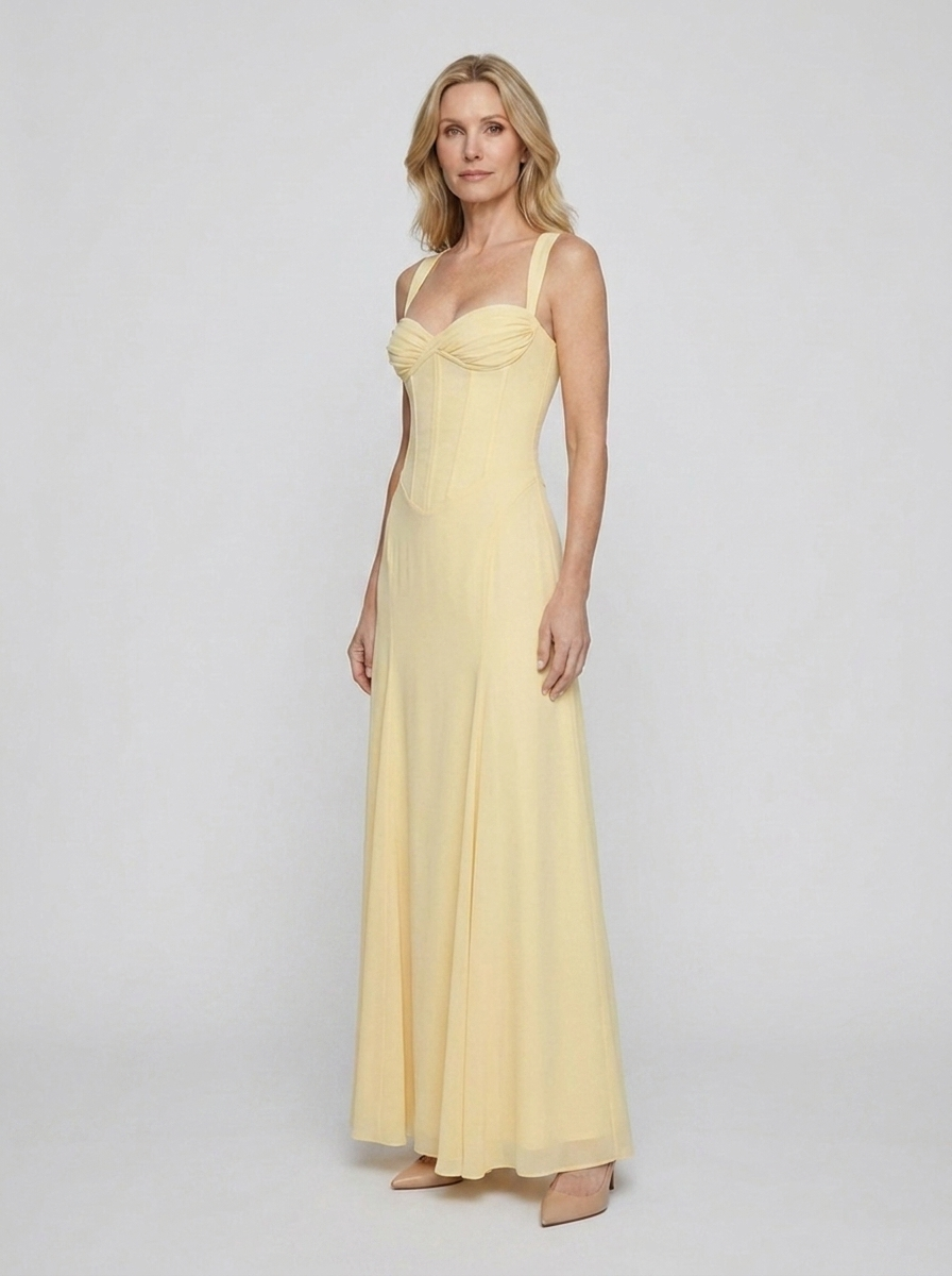 Loretta yellow maxi dress on model three quarter