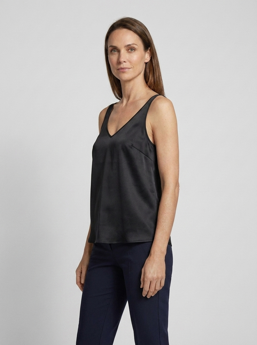 Freya satin V-neck camisole in black on model, three-quarter