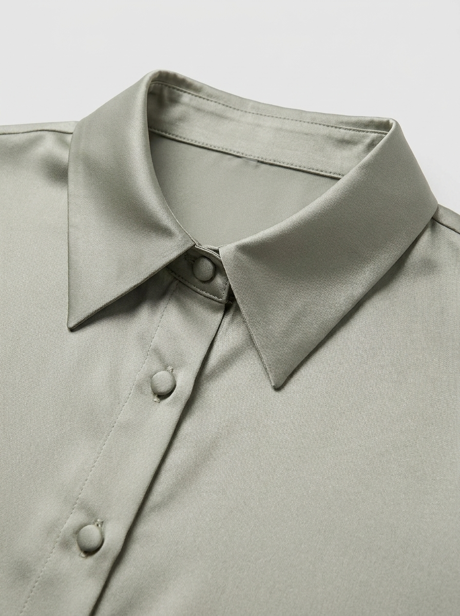 Green satin blouse collar detail