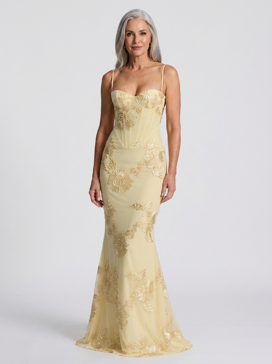 Aelara yellow maxi wedding guest dress on model front