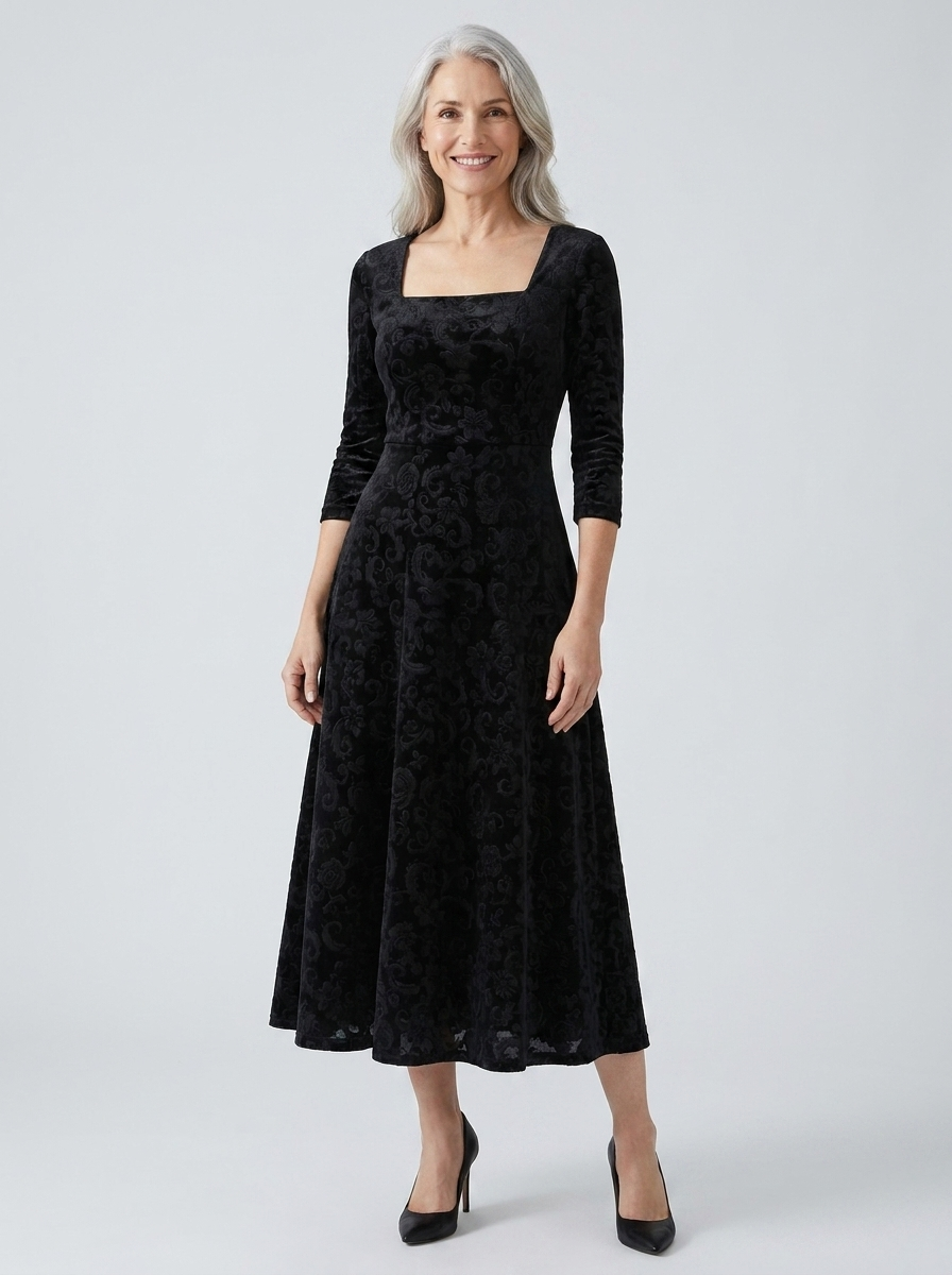 Delphine embossed velvet A-line midi dress on model, black, front