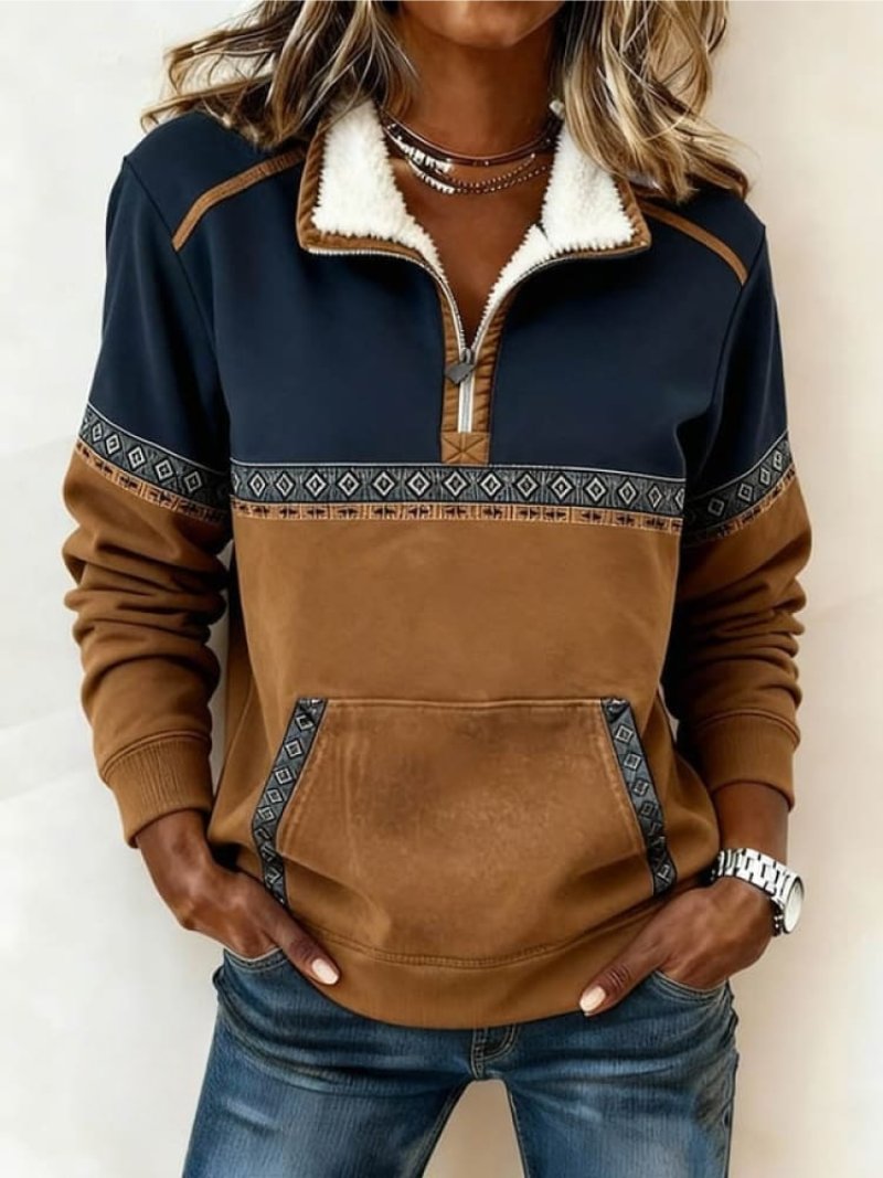 Navy and tan aztec trim quarter-zip fleece pullover with sherpa collar and kangaroo pocket